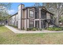 Building exterior with walkway and landscaping at 3958 Dream Oak Pl # 104, Tampa, FL 33613