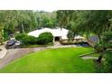 Bird's eye view of home with large yard and driveway at 11554 Monette Rd, Riverview, FL 33569