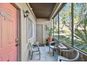 Inviting screened porch with seating, perfect for relaxing outdoors at 10265 Gandy N Blvd # 1715, St Petersburg, FL 33702