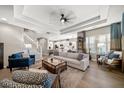 Spacious living room with hardwood floors and ample natural light at 11911 Mandevilla Ct, Tampa, FL 33626
