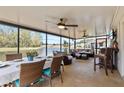 Spacious screened patio overlooking a pond, perfect for relaxing at 25237 Lexington Oaks Blvd, Wesley Chapel, FL 33544