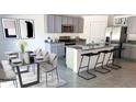 Modern kitchen with gray cabinets and an island at 2883 Gardiner Ln, Zephyrhills, FL 33541