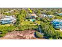 Aerial view of waterfront home with private pool and dock at 300 S Florida Ave # 400D, Tarpon Springs, FL 34689