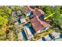 Aerial photo of condo building in wooded area at 300 S Florida Ave # 400D, Tarpon Springs, FL 34689