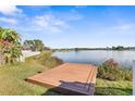 Elevated wooden dock providing scenic lake views at 6515 Clair Shore Dr, Apollo Beach, FL 33572