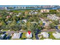 Aerial view showing home's location in a residential neighborhood near the water at 14198 89Th Ave, Seminole, FL 33776