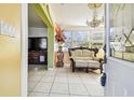 Bright living room with elegant furniture and chandelier at 1905 E Broad St, Tampa, FL 33610