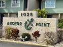 Anchor Point community sign with building number 1028 at 1028 Apollo Beach Blvd # 11, Apollo Beach, FL 33572