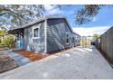 Gray house exterior with side yard and fence at 2859 38Th N Ave, St Petersburg, FL 33713