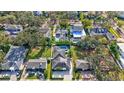 Property aerial view showcasing home, landscaping, and neighborhood at 3312 W Swann Ave, Tampa, FL 33609