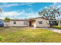 Ranch style home with a large front yard at 3724 15Th Se Ave, Largo, FL 33771