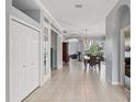 Bright and spacious entryway with tile flooring, leading to dining area at 4531 Swordfish Dr, Bradenton, FL 34208