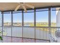 Relaxing balcony boasting serene water views and ceiling fan at 6450 Shoreline Dr # 9502, St Petersburg, FL 33708