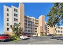 Building exterior showcasing attractive design and ample parking at 6450 Shoreline Dr # 9502, St Petersburg, FL 33708
