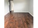 Living room with hardwood floors and neutral walls at 1605 E Bougainvillea Ave, Tampa, FL 33612