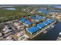 Aerial view showing community, waterfront, and pool at 1621 Watermark Ne Cir # 1621, St Petersburg, FL 33702
