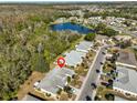 Aerial view of the property, highlighting its location within a residential neighborhood at 1936 Grand Cypress Ln, Sun City Center, FL 33573