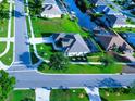 High-angle view of a house, driveway, and surrounding neighborhood at 8610 Quinn Ct, North Port, FL 34287