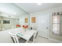 White table and chairs in a condo dining area at 5901 Bahia Del Mar Cir # 321, St Petersburg, FL 33715