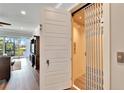 Modern home elevator providing convenient access between floors at 1308 Alhambra Dr, Apollo Beach, FL 33572