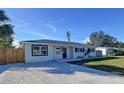 Updated single story home with a freshly painted exterior and a spacious yard at 1709 Marilyn Ave, Bradenton, FL 34207