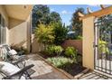 Relaxing patio space with brick pavers and small garden at 835 7Th N Ave, St Petersburg, FL 33701
