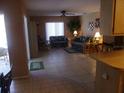 Living room with tile floors and comfy seating at 12172 Wild Acres Rd, Largo, FL 33773