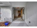 Inviting entryway with double doors leading into a bright and spacious foyer at 195 Rusk Cir, Spring Hill, FL 34606