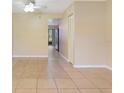 Spacious living room with tile flooring and neutral walls at 4910 Bay Ne St # 109, St Petersburg, FL 33703