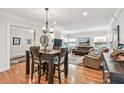 Bright dining area with hardwood floors and an open floor plan at 487 9Th N Ave, St Petersburg, FL 33701