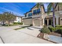 Two-story townhome with two-car garage and street view at 9236 Fox Sparrow Rd, Tampa, FL 33626