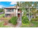Two-story condo building with private entrance and landscaping at 10265 Gandy N Blvd # 1507, St Petersburg, FL 33702
