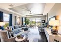 Open living area with hardwood floors and plenty of natural light at 10338 Highland Park Pl, Palmetto, FL 34221