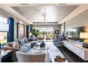 Bright living room featuring hardwood floors and a view of the lake at 10338 Highland Park Pl, Palmetto, FL 34221