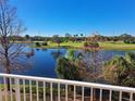 Scenic backyard view overlooking a peaceful lake and golf course at 1200 Country Club Dr # 1103, Largo, FL 33771