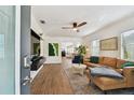 Bright living room featuring a comfortable leather sofa and modern decor at 2126 7Th N Ave, St Petersburg, FL 33713