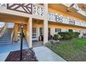 Ground level entrance with covered walkway, and a small patio area at 2311 Brisbane St # 1, Clearwater, FL 33763