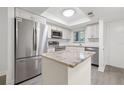 Modern kitchen with stainless steel appliances and granite countertops at 1524 Lakeview Rd # 305, Clearwater, FL 33756