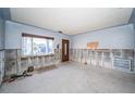 Under renovation living room with exposed walls and flooring at 17744 1St E St, Redington Shores, FL 33708