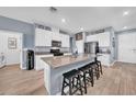 Modern kitchen with island, stainless steel appliances, and ample counter space at 34104 White Fountain Ct, Wesley Chapel, FL 33545