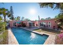 Stunning aerial view showcasing a sparkling pool and spacious backyard at 5611 8Th N Ave, St Petersburg, FL 33710