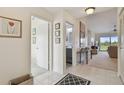 Bright and spacious entryway with views into living room and bathroom at 6181 Bahia Del Mar Blvd # 209, St Petersburg, FL 33715