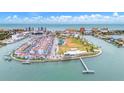 Aerial view showing community's location near beach and waterways at 320 Medallion Blvd # D, Madeira Beach, FL 33708