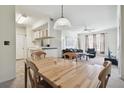 Open concept living and dining area at 5612 Pinnacle Heights Cir # 304, Tampa, FL 33624