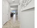 View down hallway into living area from entry at 10374 Echo Dock Loop, San Antonio, FL 33576