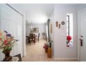 Bright and spacious entryway with views into dining room and kitchen at 17546 Fairmeadow Dr, Tampa, FL 33647
