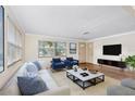 Bright and airy living room with hardwood floors and comfortable seating at 2201 Park N St, St Petersburg, FL 33710