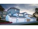 Townhouses with attached garages and landscaped rear yards at 2550 1St N Ave, St Petersburg, FL 33713