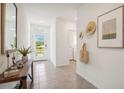Bright and airy entryway with tile floors and access to the backyard at 33174 Osprey Peak Way, San Antonio, FL 33576
