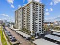 High-rise condo building with ample parking and water views at 400 Island Way # 1204, Clearwater Beach, FL 33767